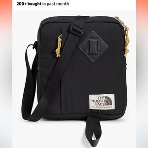 The North Face Black Messenger Bag with Yellow Accents
